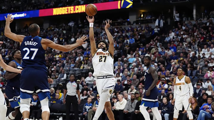 Mar 12, 2025; Denver, Colorado, USA; Denver Nuggets guard Jamal Murray (27) shoots the ball over Minnesota Timberwolves center Rudy Gobert (27) in the second half at Ball Arena. Mandatory Credit: Ron Chenoy-Imagn Images Mar 12, 2025; Denver, Colorado, USA; Denver Nuggets guard Jamal Murray (27) shoots the ball over Minnesota Timberwolves center Rudy Gobert (27) in the second half at Ball Arena. Mandatory Credit: Ron Chenoy-Imagn Images