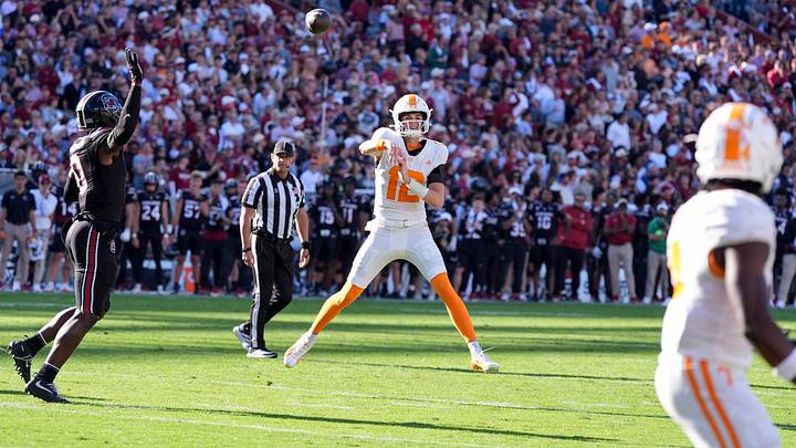 Oct 24, 2026; Columbia, South Carolina, USA;  Tennessee Volunteers quarterback George MacIntyre (12) throws a pass to wide receiver Mike Matthews (4) during the first half against the South Carolina Gamecocks at Williams-Brice Stadium.  Mandatory Credit: Jim Dedmon-Imagn Images