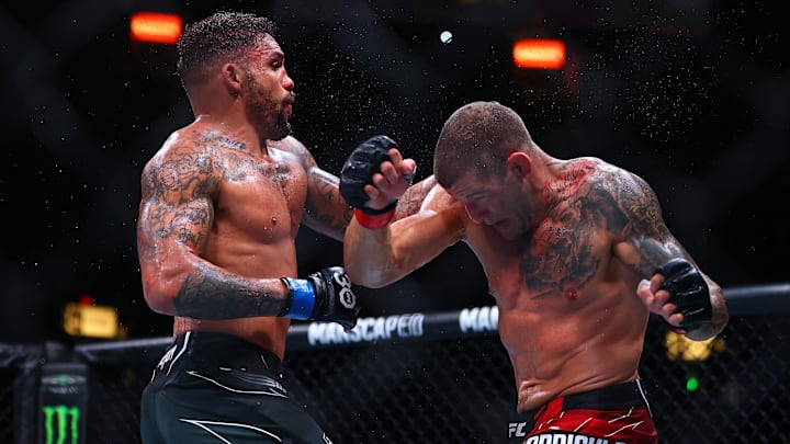 Jun 10, 2023; Vancouver, BC, Canada; Eryk Anders lands a hit against Marc-Andre Barriault during UFC 289 at Rogers Arena. Mandatory Credit: Sergei Belski-Imagn Images