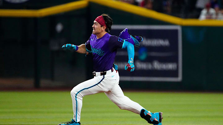 Diamondbacks outfielder Corbin Carroll (7) rounds second on the way to a triple against the Dodgers during a game at Chase Field on May 10, 2025, in Phoenix. Diamondbacks outfielder Corbin Carroll (7) rounds second on the way to a triple against the Dodgers during a game at Chase Field on May 10, 2025, in Phoenix.
