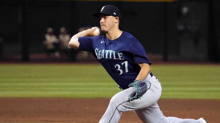 Seattle Mariners relief pitcher Paul Sewald (37) pitches against the Arizona Diamondbacks during the ninth inning at Chase Field in 2023.