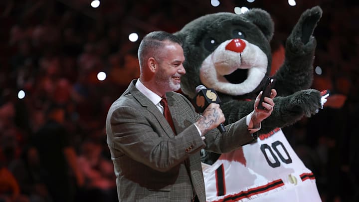 Mar 23, 2025; Houston, Texas, USA; Rapper Paul Wall talks to the crowd during the game between the Houston Rockets and the Denver Nuggets at Toyota Center. Mandatory Credit: Troy Taormina-Imagn Images