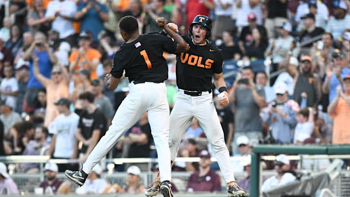 Jun 24, 2024; Omaha, NE, USA;  Tennessee Volunteers left fielder Dylan Dreiling (8) celebrates hitting a home run with second baseman Christian Moore (1) during the seventh inning at Charles Schwab Field Omaha. Mandatory Credit: Steven Branscombe-Imagn Images
