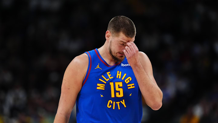  Denver Nuggets center Nikola Jokic (15) reacts to a turnover the first quarter against the Utah Jazz at Ball Arena. Mandatory Credit: Ron Chenoy-Imagn Images