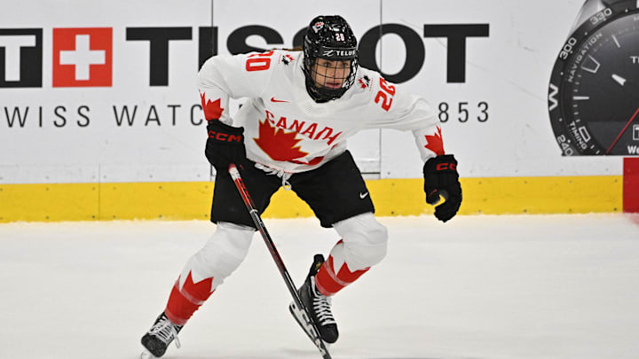 Apr 15, 2023; Brampton, Ontario, CAN;   Canada forward Sarah Nurse (20) skates with the puck against Switzerland in the first period at CAA Center. Mandatory Credit: Dan Hamilton-Imagn Images