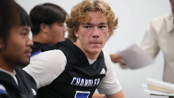 Chandler Wolves quarterback Will Mencl sits with his teammates during the high school football Championships Media Day at the Arizona Interscholastic Association office in Phoenix on Dec. 1, 2025.