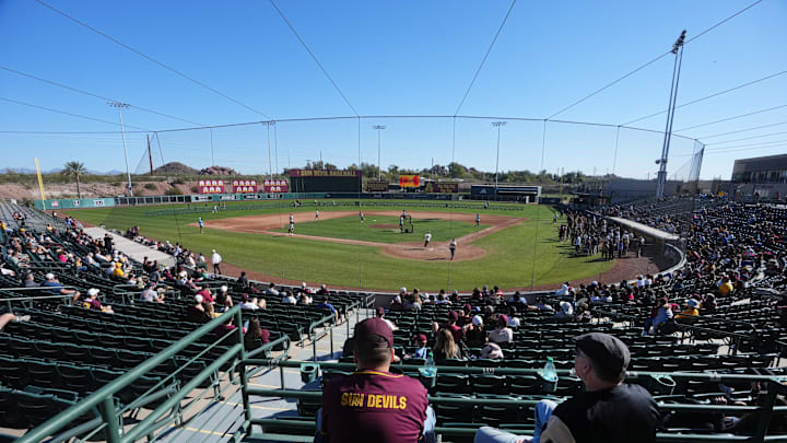 People watch the second annual alumni and celebrity softball game to kick off the ASU baseball season at Phoenix Municipal Stadium on Feb. 1, 2026. People watch the second annual alumni and celebrity softball game to kick off the ASU baseball season at Phoenix Municipal Stadium on Feb. 1, 2026.