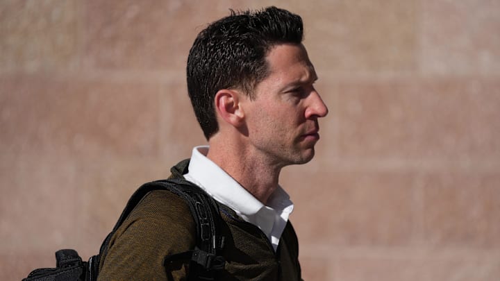 Mar 12, 2022; Mesa, AZ, USA; Chicago Cubs assistant general manager Craig Breslow arrives during a spring training workout at Sloan Park. Mandatory Credit: Joe Camporeale-Imagn Images