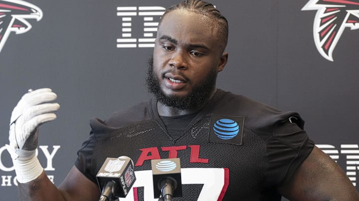 Jul 25, 2024; Buford, GA, USA; Atlanta Falcons defensive end Grady Jarrett (97) talks to the media on the first day of training camp at Falcons Training Camp. Mandatory Credit: Dale Zanine-Imagn Images