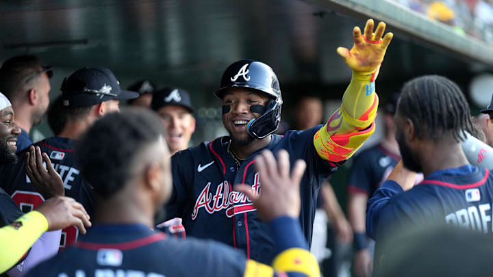 Jul 9, 2025; West Sacramento, California, USA; Atlanta Braves right fielder Ronald Acuna Jr. (13) is congratulated by teammates after hitting a home run against the Athletics in the fourth inning at Sutter Health Park. Mandatory Credit: Cary Edmondson-Imagn Images