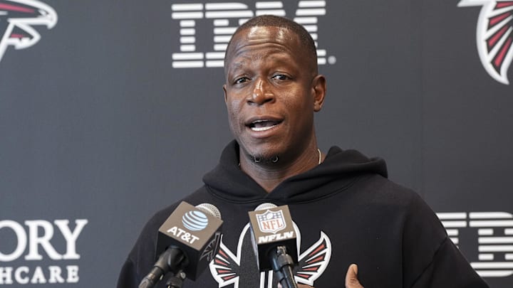 Jul 24, 2025; Flowery Branch, GA, USA; Atlanta Falcons head coach Raheem Morris addresses the media on the first day of practice during training camp at IBM Performance Field. Mandatory Credit: Dale Zanine-Imagn Images