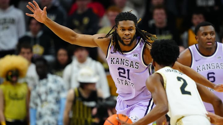 Feb 25, 2026; Boulder, Colorado, USA; Kansas State Wildcats forward Khamari McGriff (21) during the first half against the Colorado Buffaloes at the CU Events Center. Mandatory Credit: Ron Chenoy-Imagn Images