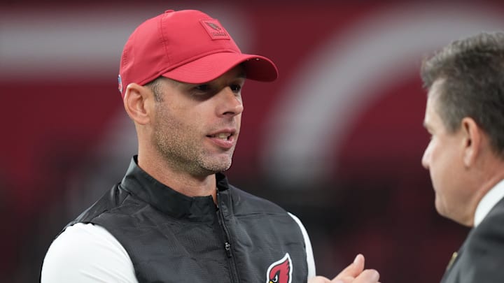 Arizona Cardinals head coach Jonathan Gannon embraces team owner Michael Bidwill before the team plays the Jacksonville Jaguars at State Farm Stadium on Nov. 23, 2025. Arizona Cardinals head coach Jonathan Gannon embraces team owner Michael Bidwill before the team plays the Jacksonville Jaguars at State Farm Stadium on Nov. 23, 2025.