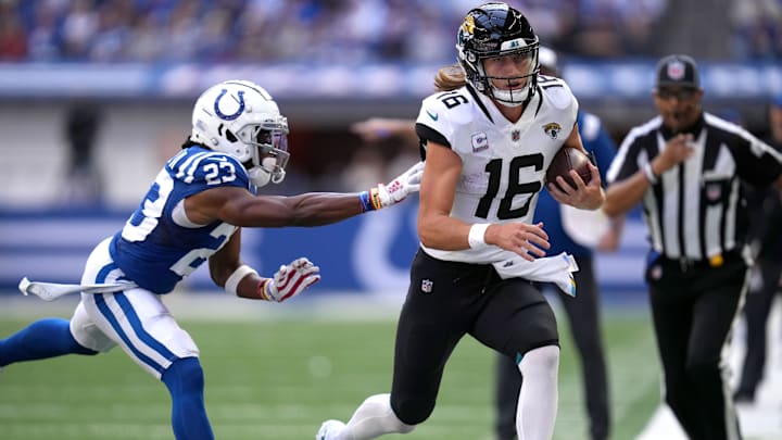 Indianapolis Colts cornerback Kenny Moore II (23) chases Jacksonville Jaguars quarterback Trevor Lawrence.