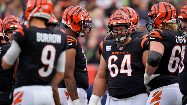 Cincinnati Bengals center Ted Karras (64) awaits a play in the huddle during the first quarter of