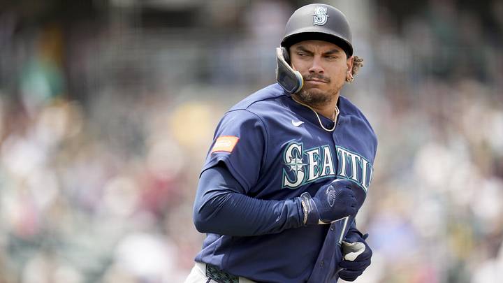 May 27, 2026; West Sacramento, California, USA; Seattle Mariners first baseman Josh Naylor (12) looks towards the dugout after hitting a single against the Athletics in the seventh inning at Sutter Health Park. Mandatory Credit: Cary Edmondson-Imagn Images