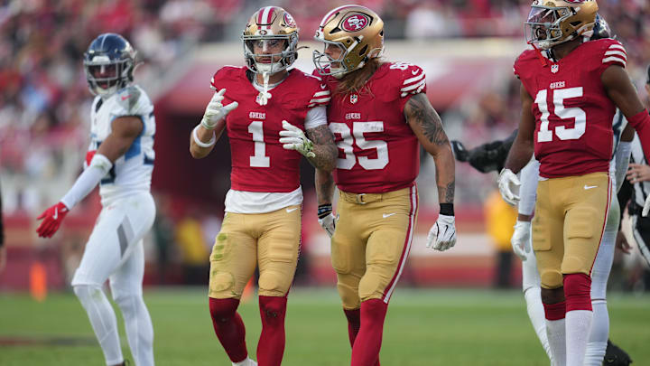 Dec 14, 2025; Santa Clara, California, USA;  San Francisco 49ers wide receiver Ricky Pearsall (1) and tight end George Kittle (85) talk during the third quarter against the Tennessee Titans at Levi's Stadium. Mandatory Credit: Cary Edmondson-Imagn Images