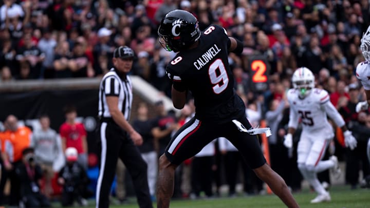 Cincinnati Bearcats wide receiver Jeff Caldwell (9) catches a touchdown pass in the first quarter of the NCAA football game between the Cincinnati Bearcats and Arizona Wildcats at Nippert Stadium in Cincinnati on Nov. 15, 2025.