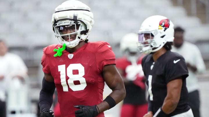 Arizona Cardinals receiver Marvin Harrison Jr. (18) lines up during training camp at State Farm Stadium in Glendale, Ariz., on Monday, July 29, 2024. Arizona Cardinals receiver Marvin Harrison Jr. (18) lines up during training camp at State Farm Stadium in Glendale, Ariz., on Monday, July 29, 2024.