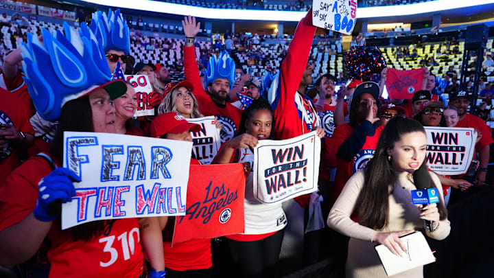 May 3, 2025; Denver, Colorado, USA; LA Clippers fans cheer before the game against the Denver Nuggets in game seven of first round for the 2025 NBA Playoffs at Ball Arena. Mandatory Credit: Ron Chenoy-Imagn Images