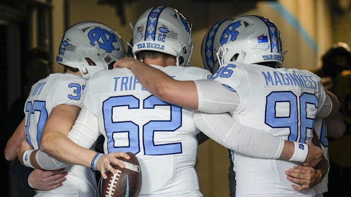 Dec 27, 2023; Charlotte, NC, USA; North Carolina Tar Heels special teams gather in the tunnel during pregame warm ups against the West Virginia Mountaineers at Bank of America Stadium. 