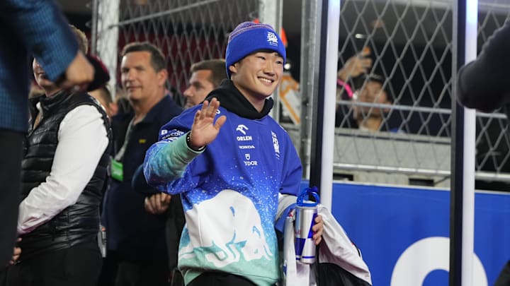 Nov 23, 2024; Las Vegas, Nevada, USA; Visa Cash App RB Formula One Team driver Yuki Tsunoda of Japan (22) arrives for the Las Vegas Grand Prix drivers parade at the Las Vegas Circuit. Mandatory Credit: Lucas Peltier-Imagn Images