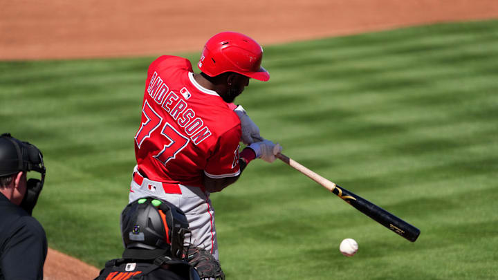 Mar 2, 2025; Scottsdale, Arizona, USA; Los Angeles Angels shortstop Tim Anderson bats against the San Francisco Giants during the third inning at Scottsdale Stadium. Mandatory Credit: Joe Camporeale-Imagn Images