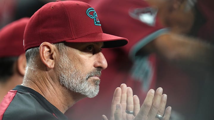 Arizona Diamondbacks manager Torey Lovullo watches his team from the dugout as they play against the Houston Astros at Chase Field on July 21, 2025.