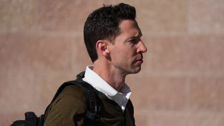 Mar 12, 2022; Mesa, AZ, USA; Chicago Cubs assistant general manager Craig Breslow arrives during a spring training workout at Sloan Park. Mandatory Credit: Joe Camporeale-USA TODAY Sports Mar 12, 2022; Mesa, AZ, USA; Chicago Cubs assistant general manager Craig Breslow arrives during a spring training workout at Sloan Park. Mandatory Credit: Joe Camporeale-USA TODAY Sports