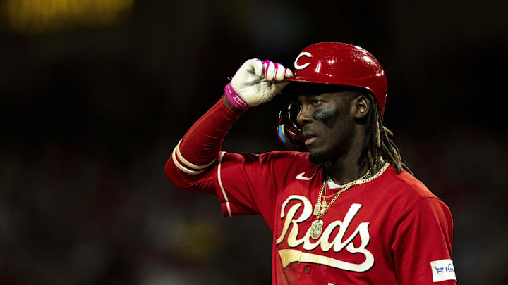 Sep 23, 2023; Cincinnati, Ohio, USA; Cincinnati Reds shortstop Elly De La Cruz (44) adjusts his helmet during his at bat in the fifth inning against the Pittsburgh Pirates at Great American Ball Park. Mandatory Credit: The Cincinnati Enquirer-Imagn Images