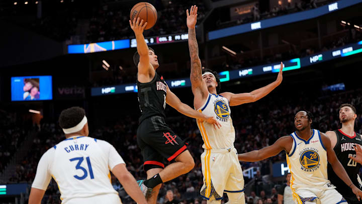 Apr 5, 2026; San Francisco, California, USA; Houston Rockets guard Reed Sheppard (15) makes a shot over Golden State Warriors forward Gui Santos (15) in the fourth quarter at the Chase Center. Mandatory Credit: Cary Edmondson-Imagn Images