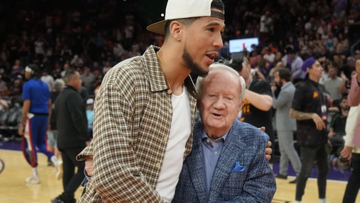 Broadcaster Al McCoy is embraced by Suns shooting guard Devin Booker after being honored for 51 seasons as \"the Voice of the Suns\" during halftime against the Los Angeles Clippers on April 9, 2023, at Footprint Center in Phoenix.
Al McCoy and Devin Booker embrace Broadcaster Al McCoy is embraced by Suns shooting guard Devin Booker after being honored for 51 seasons as \"the Voice of the Suns\" during halftime against the Los Angeles Clippers on April 9, 2023, at Footprint Center in Phoenix.
Al McCoy and Devin Booker embrace