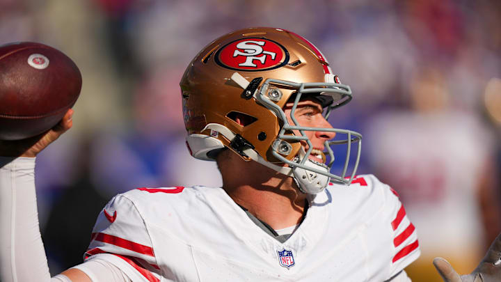 Nov 2, 2025; East Rutherford, New Jersey, USA; San Francisco 49ers quarterback Mac Jones (10) passes the ball against the New York Giants during the first half at MetLife Stadium. Mandatory Credit: Robert Deutsch-Imagn Images