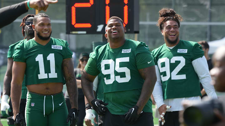 Florham Park, NJ -- July 27, 2024 -- Defensive players, Jermaine Johnson, Quinnen Williams and Levi Fotu get ready for the upcoming season at New York Jets training camp this morning. Florham Park, NJ -- July 27, 2024 -- Defensive players, Jermaine Johnson, Quinnen Williams and Levi Fotu get ready for the upcoming season at New York Jets training camp this morning.