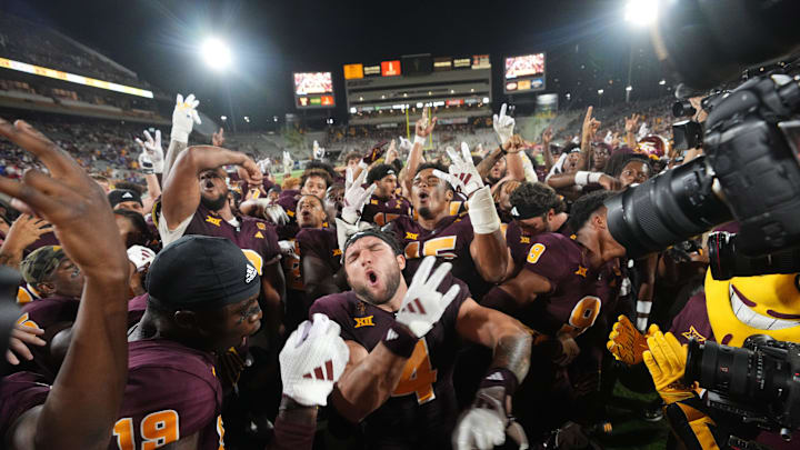 Arizona State running back Cam Skattebo (4) celebrates with his teammates after their 35-31 win against the Kansas Jayhawks at Mountain America Stadium in Tempe on Oct. 5, 2024. Arizona State running back Cam Skattebo (4) celebrates with his teammates after their 35-31 win against the Kansas Jayhawks at Mountain America Stadium in Tempe on Oct. 5, 2024.
