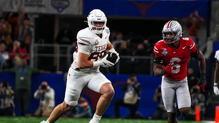 Texas Longhorns tight end Gunnar Helm (85) runs the ball during the College Football Playoff semifinal game against Ohio State in the Cotton Bowl at AT&T Stadium on Friday, Jan. 10, 2024 in Arlington, Texas.