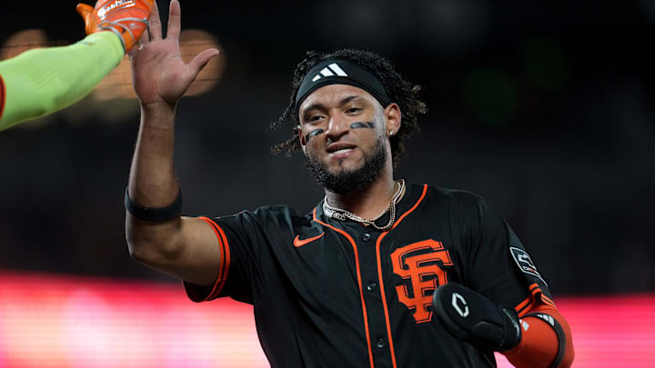 Sep 13, 2025; San Francisco, California, USA; San Francisco Giants center fielder Luis Matos (29) is congratulated after scoring a run against the Los Angeles Dodgers in the fifth inning at Oracle Park. Mandatory Credit: Cary Edmondson-Imagn Images Sep 13, 2025; San Francisco, California, USA; San Francisco Giants center fielder Luis Matos (29) is congratulated after scoring a run against the Los Angeles Dodgers in the fifth inning at Oracle Park. Mandatory Credit: Cary Edmondson-Imagn Images
