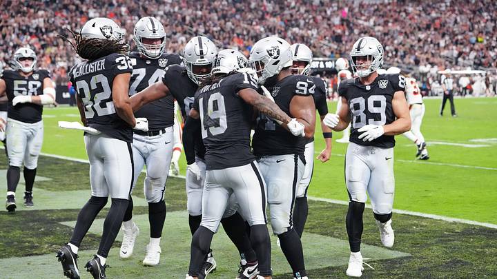 Sep 29, 2024; Paradise, Nevada, USA; Las Vegas Raiders wide receiver DJ Turner (19) celebrates with team mates after scoring a touchdown against the Cleveland Browns during the third quarter at Allegiant Stadium. Mandatory Credit: Stephen R. Sylvanie-Imagn Images