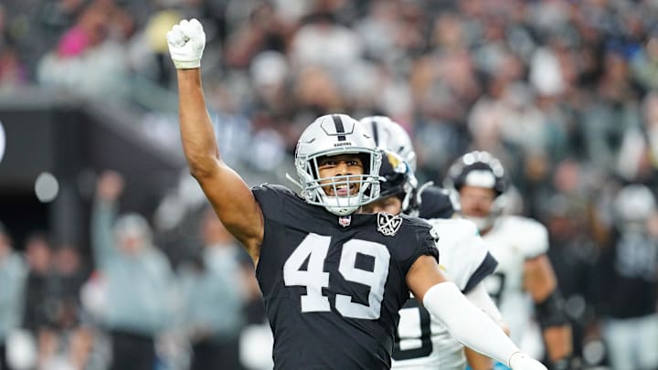 Dec 22, 2024; Paradise, Nevada, USA; Las Vegas Raiders defensive end Charles Snowden (49) celebrates after a play against the Jacksonville Jaguars during the second quarter at Allegiant Stadium. Mandatory Credit: Stephen R. Sylvanie-Imagn Images