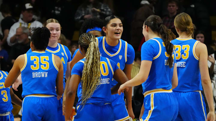 Jan 19, 2024; Boulder, Colorado, USA; UCLA Bruins center Lauren Betts (51), guard Camryn Brown (35) and guard Charisma Osborne (20) celebrate together. Jan 19, 2024; Boulder, Colorado, USA; UCLA Bruins center Lauren Betts (51), guard Camryn Brown (35) and guard Charisma Osborne (20) celebrate together.