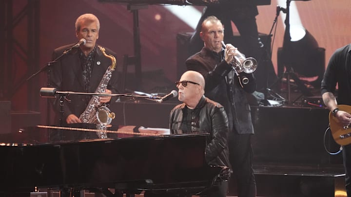 Billy Joel performs  at the 66th annual Grammy Awards. 