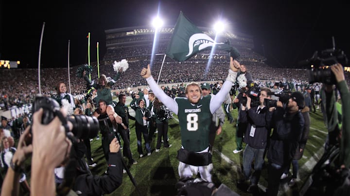 Michigan State's QB Kirk Cousins celebrates in front of the student section after his Hail Mary TD pass to Keith Nichol for the winning touchdown as time expired for a 37-31 win over Wisconsin in East Lansing on Oct. 22,  2011.

Kirk Cousins MSU