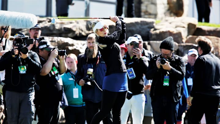 Paige Spiranac takes a swing at the Bass Pro Shops Legends Competition at Top of the Rock on Sunday, April 28, 2019