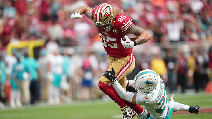 San Francisco 49ers tight end George Kittle runs the ball against Miami Dolphins safety Zayne Anderson in the third quarter at Levi's Stadium. Mandatory Credit: Cary Edmondson-Imagn Images San Francisco 49ers tight end George Kittle runs the ball against Miami Dolphins safety Zayne Anderson in the third quarter at Levi's Stadium. Mandatory Credit: Cary Edmondson-Imagn Images
