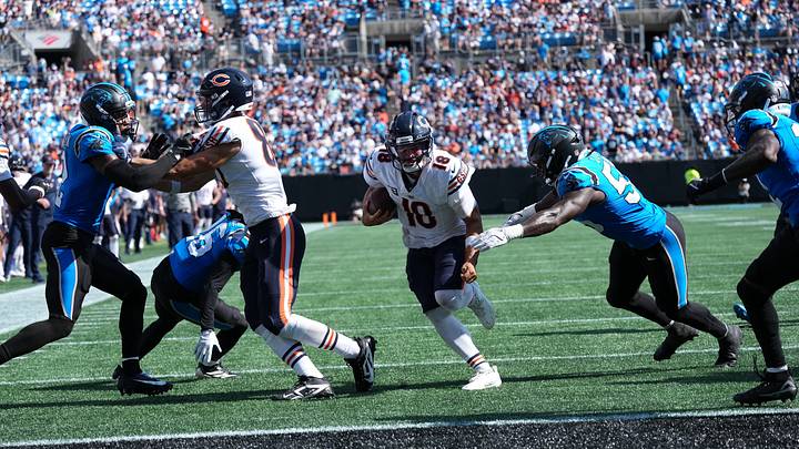 Chicago Bears quarterback Caleb Williams (18) runs the ball in the second half against the Carolina Panthers at Bank of America Stadium. Mandatory Credit: Jim Dedmon-Imagn Images Chicago Bears quarterback Caleb Williams (18) runs the ball in the second half against the Carolina Panthers at Bank of America Stadium. Mandatory Credit: Jim Dedmon-Imagn Images