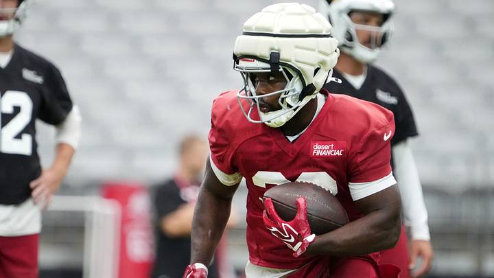 Arizona Cardinals running back Trey Benson (33) practices during training camp at State Farm Stadium in Glendale on July 26, 2026. Arizona Cardinals running back Trey Benson (33) practices during training camp at State Farm Stadium in Glendale on July 26, 2026.