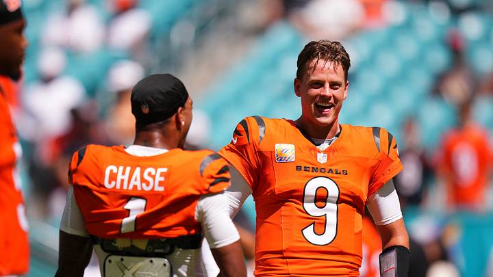 Oct 11, 2026; Miami Gardens, Florida, USA;  Cincinnati Bengals wide receiver Ja'Marr Chase (1) laughs with quarterback Joe Burrow (9) before the game against the Miami Dolphins at Hard Rock Stadium.  Mandatory Credit: Rich Storry-Imagn Images