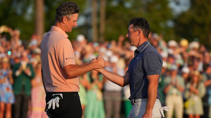 Rory McIlroy (right) was warmly congratulated by Justin Rose after their Masters playoff, won by McIlroy.