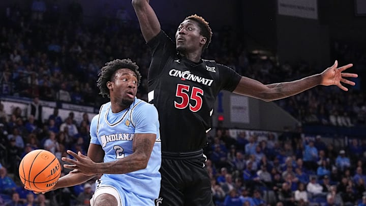 Indiana State Sycamores guard Isaiah Swope (2) goes in to pass the ball against the Cincinnati Bearcats.