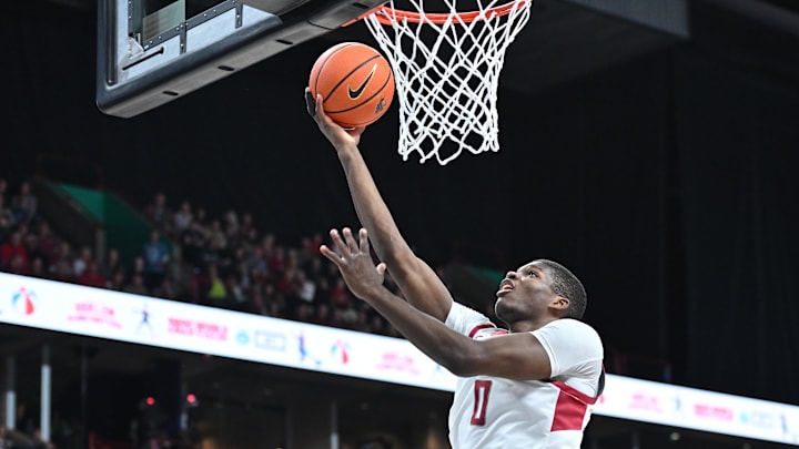 Nov 21, 2024; Spokane, Washington, USA; Washington State Cougars guard Cedric Coward (0) makes an easy lay up against the Eastern Washington Eagles in the first half at Spokane Veterans Memorial Arena. Mandatory Credit: James Snook-Imagn Images